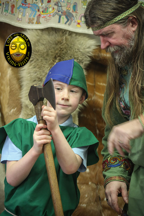 A closer look at the artefacts during a Viking in school session.